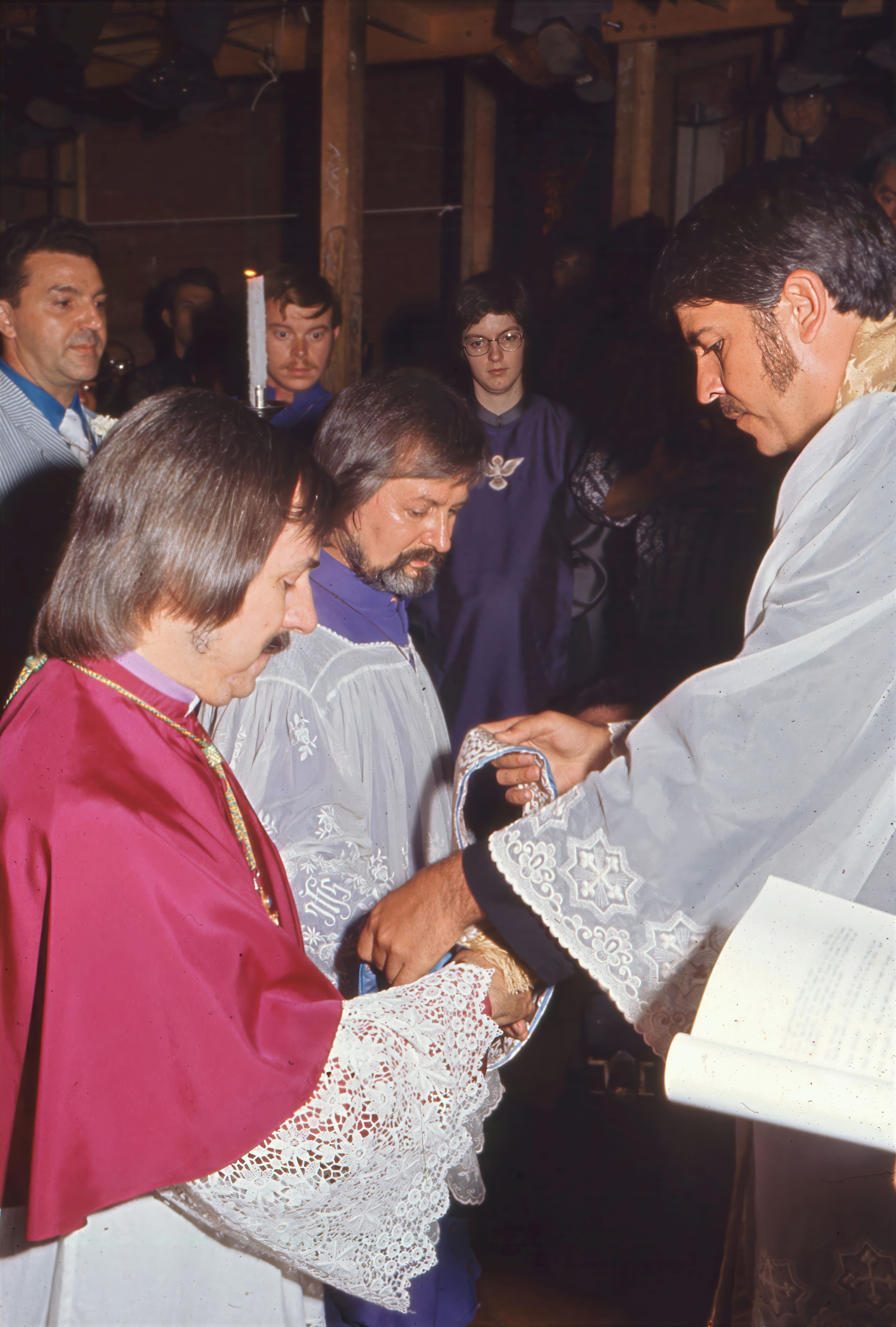 Pastor Troy Perry, founder of the Metropolitan Community Church, officiates the Holy Union of Robert Mary Clement and John Darcy Noble at the Performing Garage, 33 Wooster Street in Manhattan's SoHo district. The ceremony was relocated after Fr. Robert Weeks, rector of the Church of the Holy Apostles in Chelsea, refused to allow the service to be held at Holy Apostles because of concerns over the anticipated media attention.