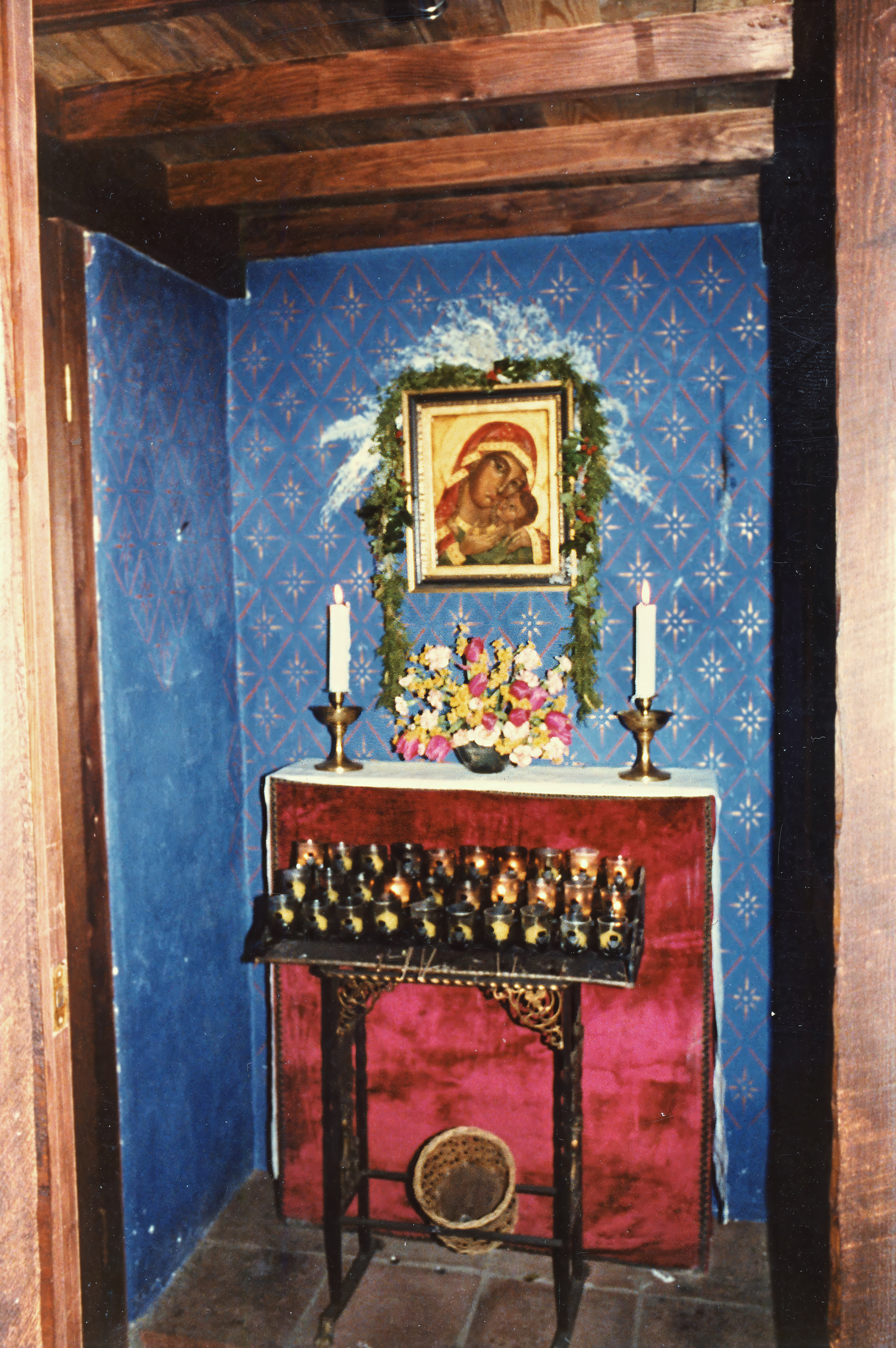 A side chapel dedicated to the Blessed Virgin Mary provided a quiet place for personal prayer within the Church of the Beloved Disciple. Centered on an icon painted by John Darcy Noble, the shrine was adorned with candles, flowers, and votive lights, reflecting the congregation's enduring practice of traditional Catholic devotion. Like the church's public processions and liturgical celebrations, the shrine affirmed that contemplative prayer and Marian piety remained central to the spiritual life of this pioneering LGBTQ-affirming community.