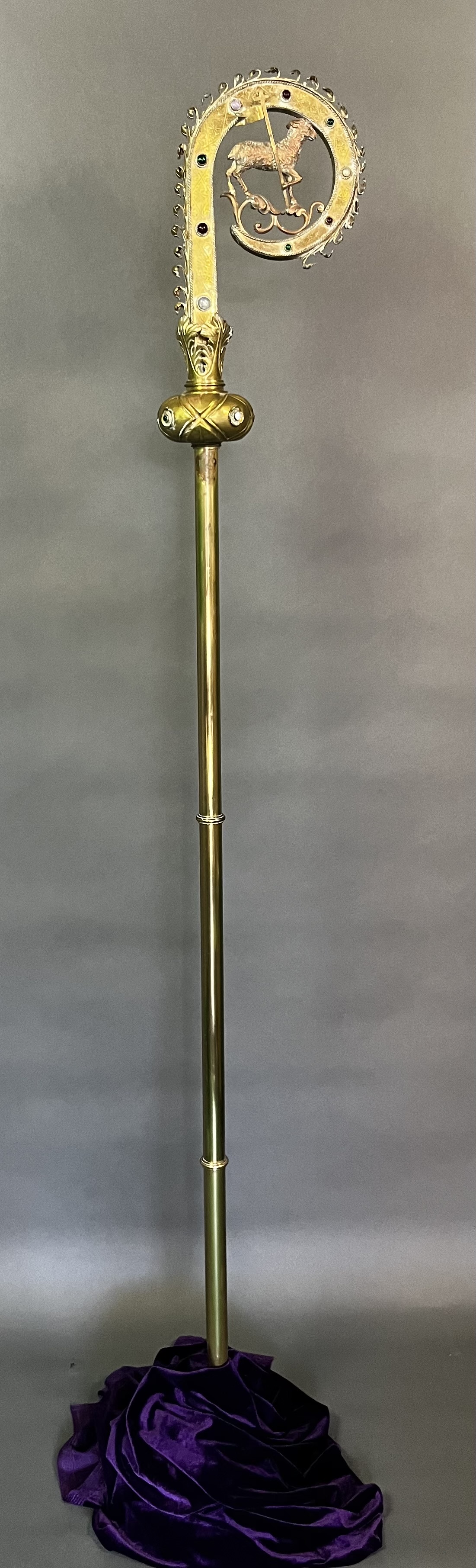 This brass bishop's crozier served as the pastoral staff of Archbishop Robert Mary Clement throughout his episcopal ministry in the Church of the Beloved Disciple. Carried during pontifical liturgies, ordinations, sacred processions, and public demonstrations, the crozier became one of the most recognizable symbols of the church's apostolic ministry. Its richly ornamented head reflects medieval ecclesiastical craftsmanship while expressing the community's commitment to the continuity of historic Catholic tradition within an affirming ministry to LGBTQ Christians.